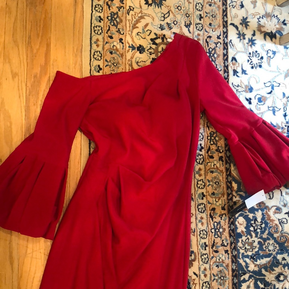 Red one shoulder long sleeve gown